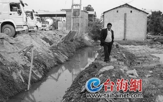 污水沟被堵 龙海村民十几万元蘑菇可能绝收 ()